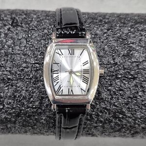 Quartz watch women's black leather band silvertone face glow in the dark hands